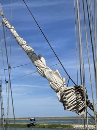 Low angle view of sailboat against sky