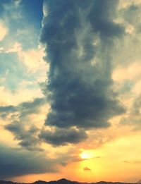 Low angle view of dramatic sky during sunset