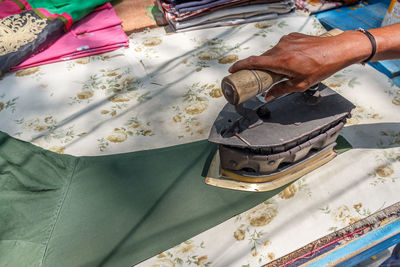 High angle view of person on table