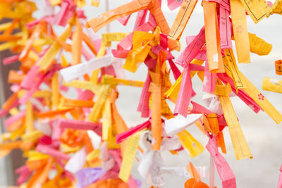 Low angle view of colorful decoration hanging against temple