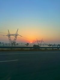 Scenic view of sea against clear sky during sunset