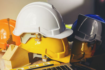 Close-up of yellow hat on table