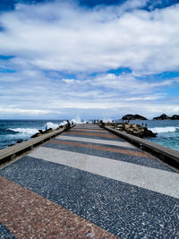 Breakwater against sky