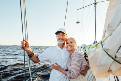Senior couple travelling on boat