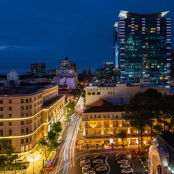 Central buildings in ho chi minh city are illuminated at night