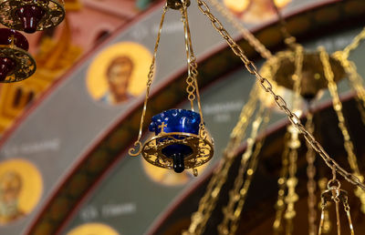 Close-up of decoration hanging on rope