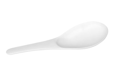 Close-up of fork over white background