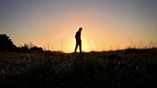 Silhouette people at sunset