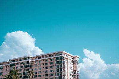 Low angle view of building against blue sky