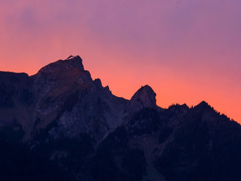 Scenic view of mountains against sky during sunset