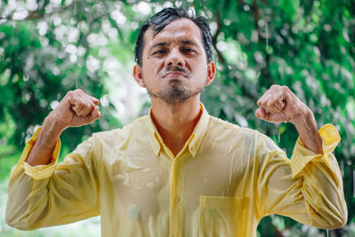 Portrait of man standing outdoors