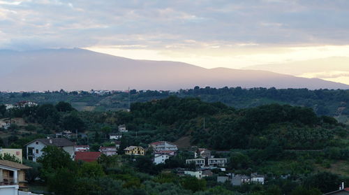 High angle view of town against sky during sunset