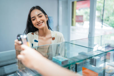 Young woman using mobile phone