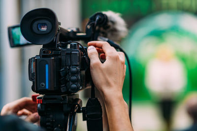 Tv camera at a green energy public media event