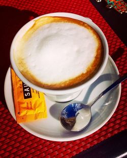 Close-up of coffee cup on table