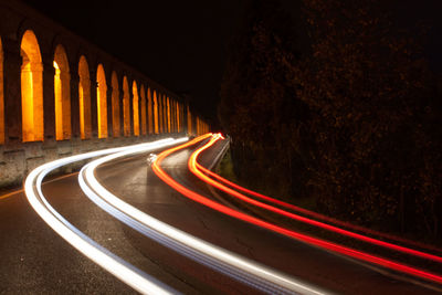 Light trails on road at night