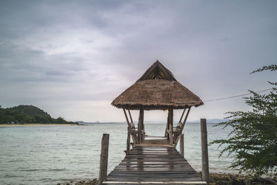 Wooden floor on sea view and beach at koh talu island, prachuap khiri khan, thailand