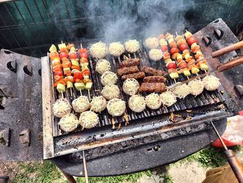 High angle view of food on barbecue grill