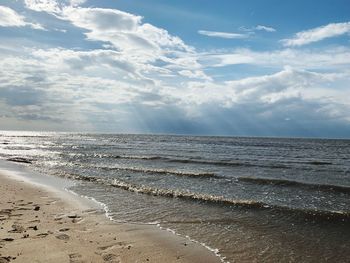 Scenic view of beach against sky