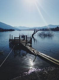 Scenic view of lake at sunset