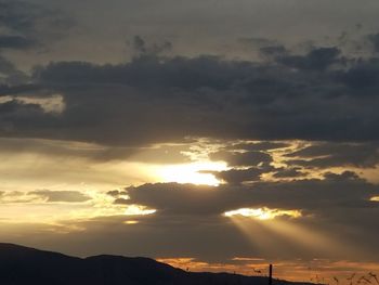 Scenic view of dramatic sky during sunset