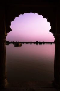 Reflection of sky in lake at sunset