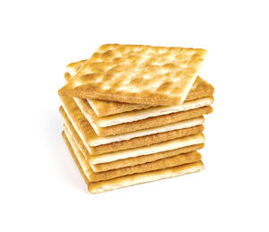 Close-up of bread against white background