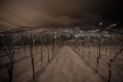 Panoramic shot of illuminated buildings in city at night