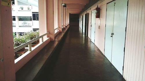 Empty walkway in corridor