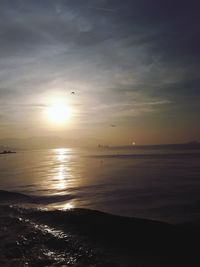 View of sea against sunset sky