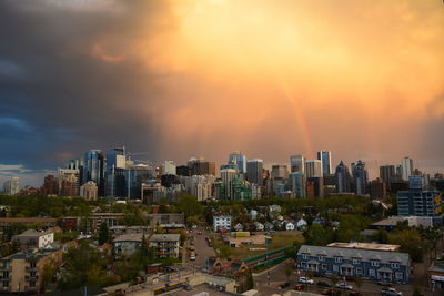 High angle view of buildings against sky during sunset