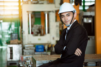 Portrait of young man standing outdoors