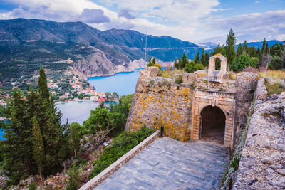 Castle on mountain against sky