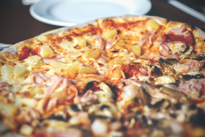 Close-up of pizza served in plate