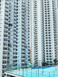 Low angle view of modern buildings in city