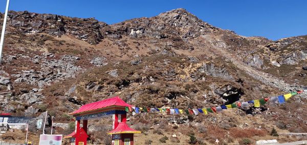 Scenic view of mountain range against clear sky