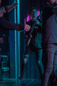 People standing at music concert