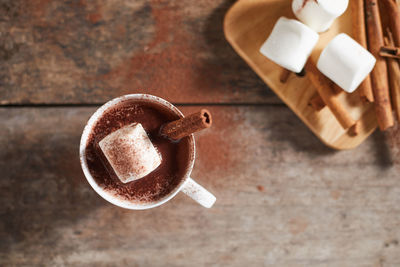 Close-up of coffee in jar on table