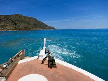 High angle view of sea against clear blue sky