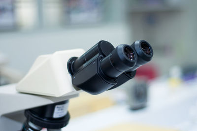 Close-up of microscope in laboratory
