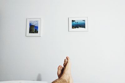 Low section of person relaxing at home