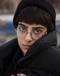 Portrait of young girl wearing knit hat