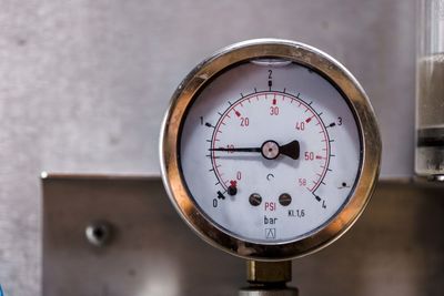 Close-up of gauge on machine