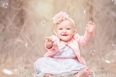 Portrait of cute baby girl outdoors