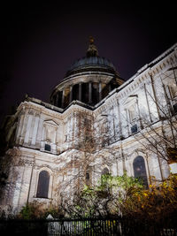 Low angle view of cathedral against sky at night