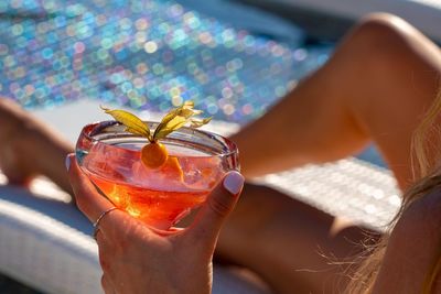 Close-up of hand holding drink