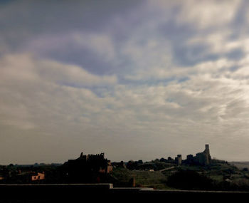 Built structure against cloudy sky