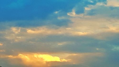 Low angle view of clouds in sky during sunset