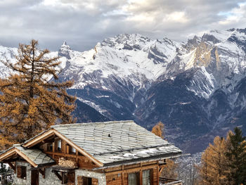 Scenic view of snowcapped mountains against sky