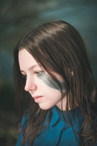 Close-up of young woman with face paint